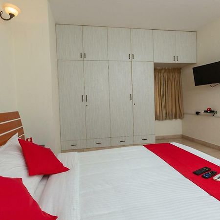Oyo 23202 Cute Orange Service Apartments Chennai Bagian luar foto