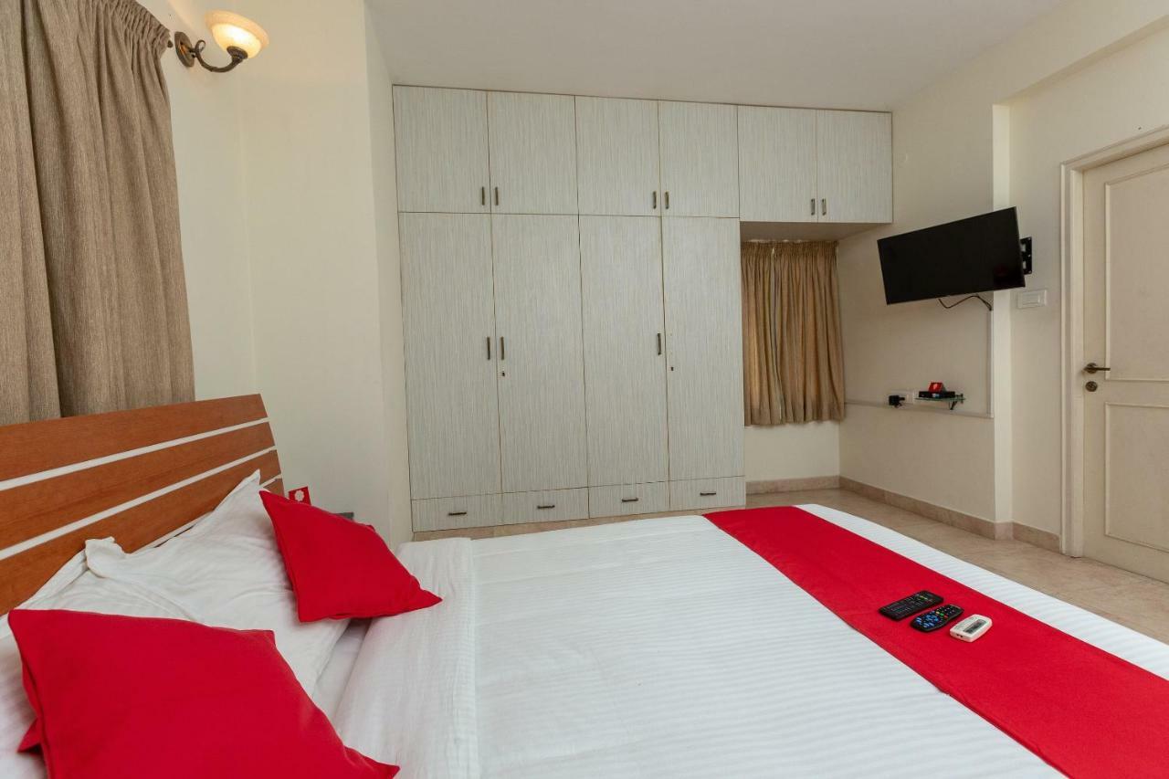 Oyo 23202 Cute Orange Service Apartments Chennai Bagian luar foto